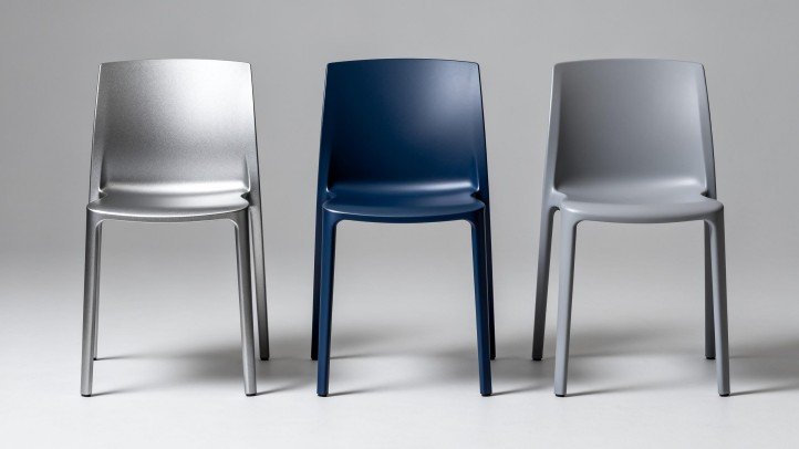 Cast aluminum, powder-coated aluminum, and polypropylene chairs side by side