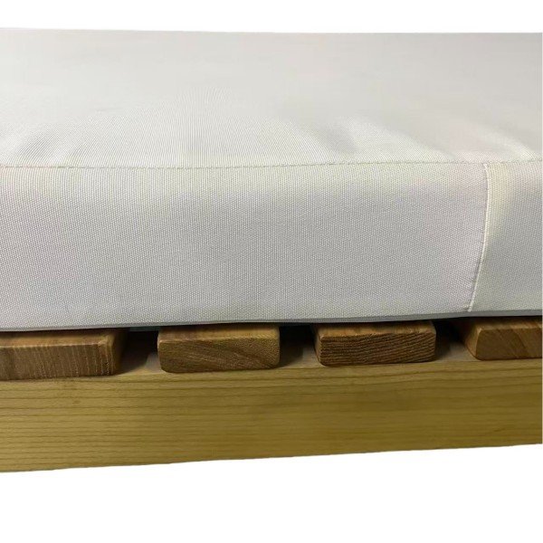 Close-up of thick outdoor cushion over a ventilated teak slat seat, highlighting water-repellent fabric and easy-dry structure for daily patio use.