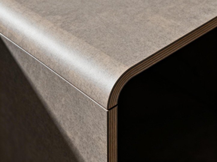 Inconspicuous solid-surface seam with coved edge eliminating crevices